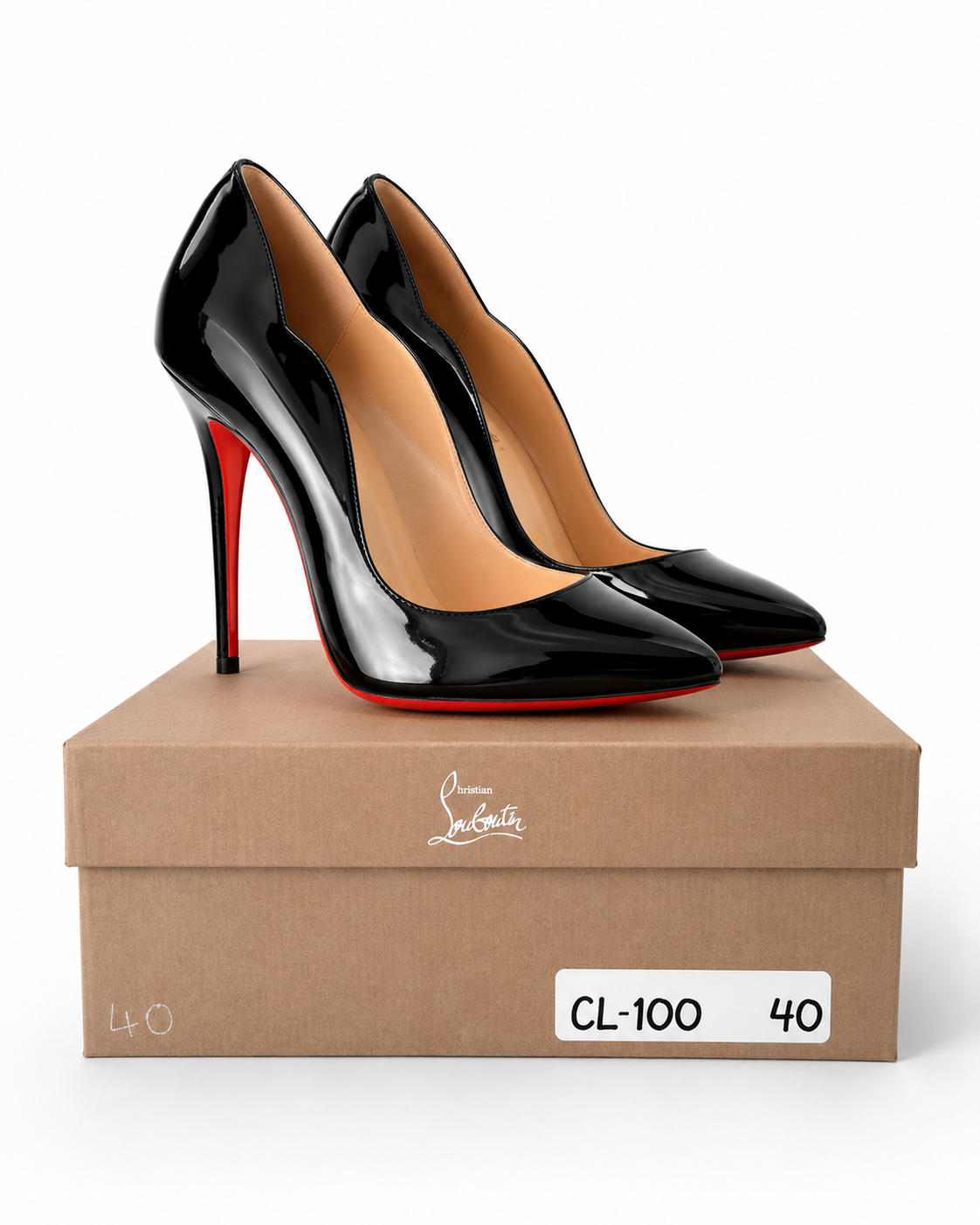 A pair of black patent leather high-heeled pumps with red soles, displayed on top of a brown Christian Louboutin shoebox against a white background.