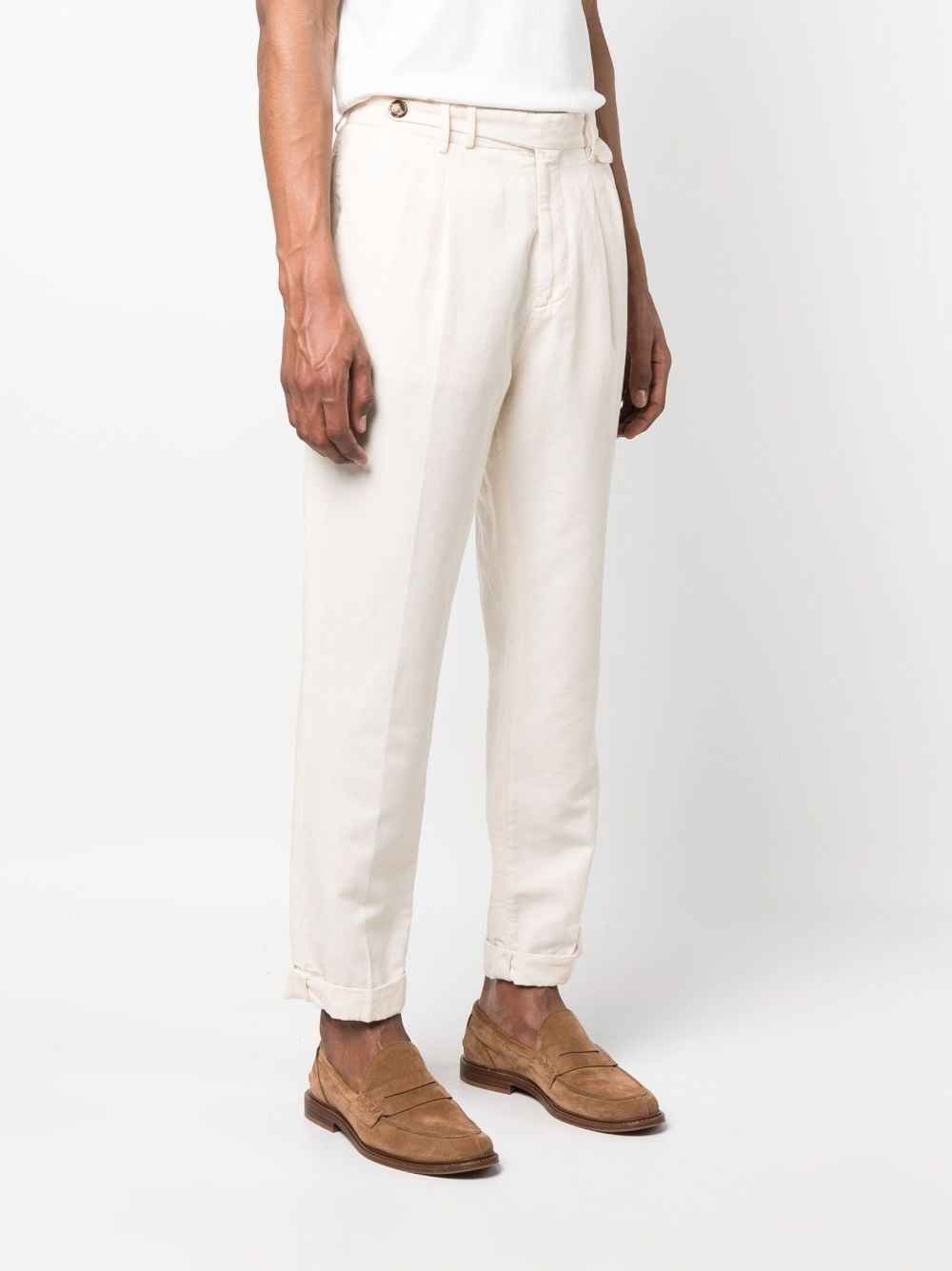 BRUNELLO CUCINELLI MEN'S OFF-WHITE PLEATED TROUSERS WITH CUFFS