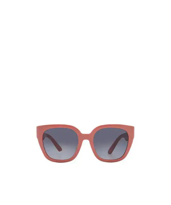A pair of chunky square sunglasses with a dusty rose pink frame and dark gray gradient lenses, shown against a plain white background.