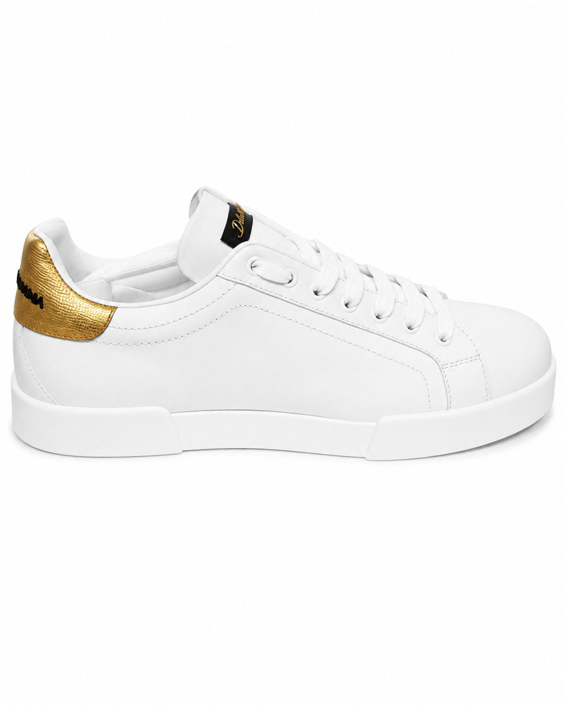A white leather low-top sneaker with a metallic gold heel accent and a black brand tab on the tongue, shown from a side profile on a white background.