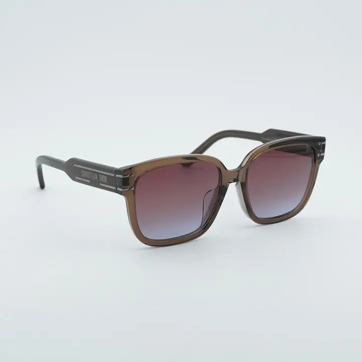 A pair of square sunglasses with a translucent brown acetate frame and gradient brown lenses, shown on a clean white background.